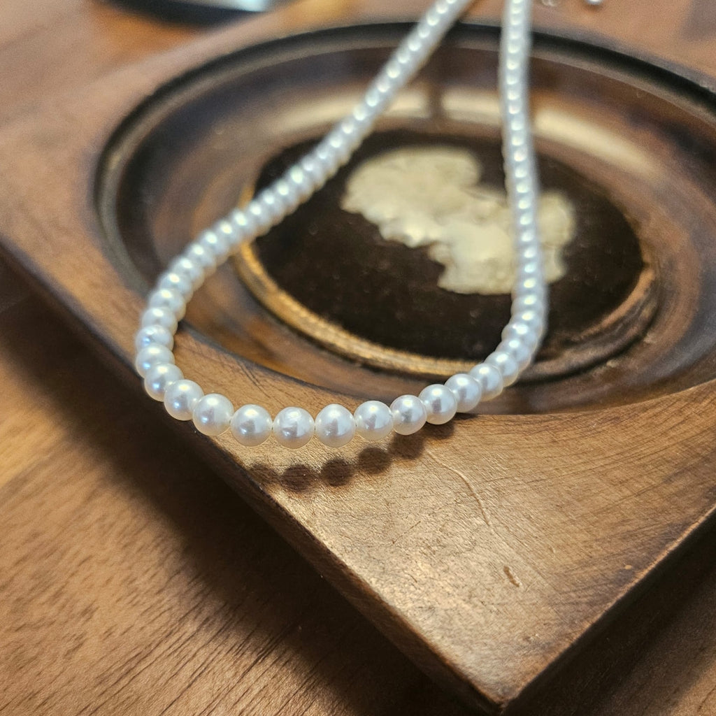 White Seed Glow · 4–4.5mm Freshwater Seed Pearl Necklace