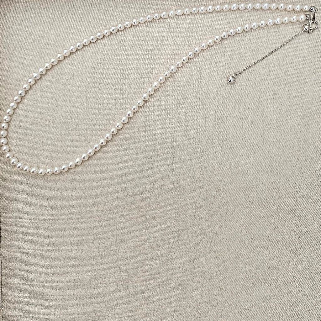 White Seed Glow · 4–4.5mm Freshwater Seed Pearl Necklace