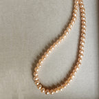 Dawnlit Peach Glow · Cultured Freshwater Pearl Necklace
