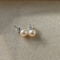 Soft White Glow ·  Freshwater Pearl Stud Earrings